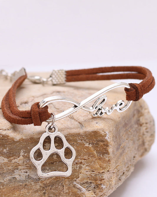 Un bracelet en corde en forme de patte de chien