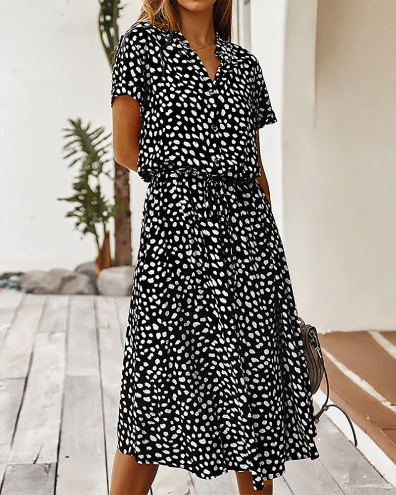 Modefest- Kleid mit V-Ausschnitt und Punktedruck Schwarz