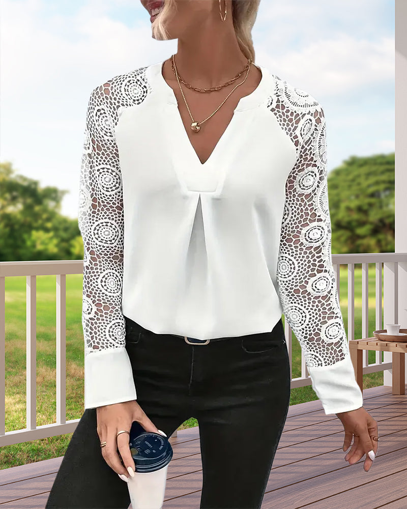 Elegant, plain blouse with long sleeves and lace