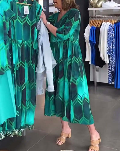 Vestido estampado con manga tres cuartos y escote en pico