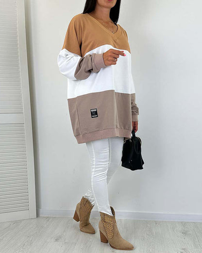 Casual, loose sweatshirt with color block print and V-neck