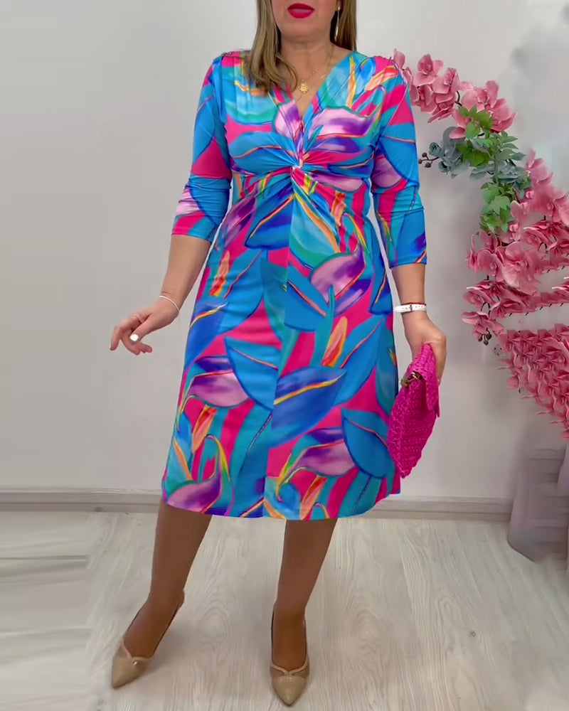 Modefest- Kleid mit dreiviertelärmeln und knoten-print