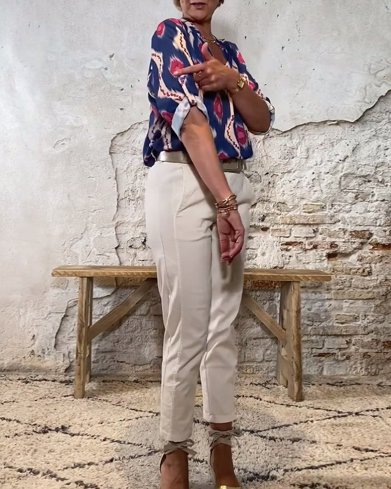 Blouse vintage avec col en V et patte de boutonnage