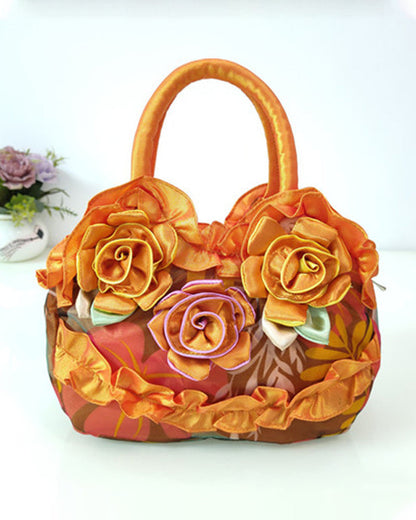 Modefest- Blumenmode-Handtasche Orange