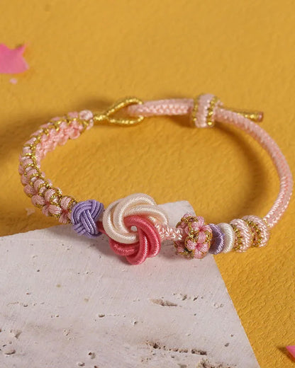 Pulseira com nós de flor de pêssego