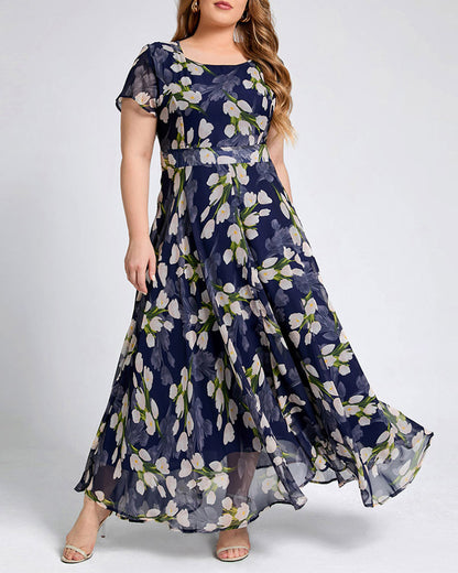 Modefest- Ein Linienkleid mit Blumendruck und kurzen Ärmeln Marineblau
