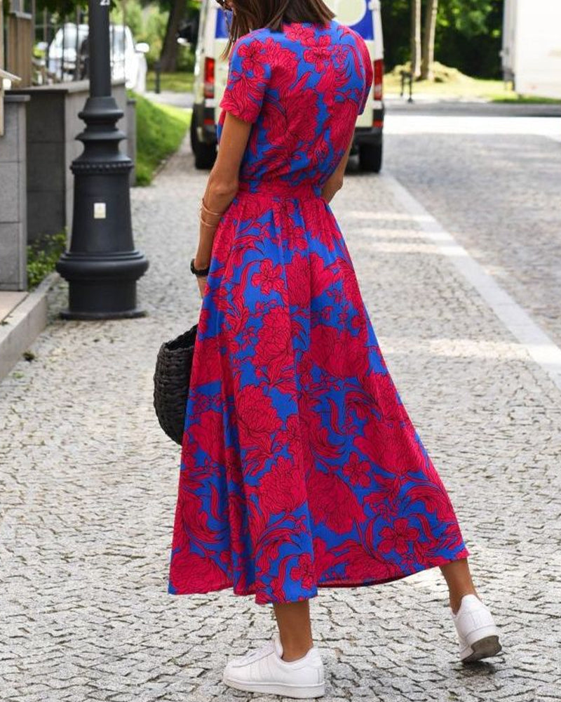 Modefest- Kleid mit modischem Print und V-Ausschnitt