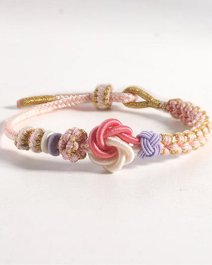 Pulsera con nudos de flor de durazno