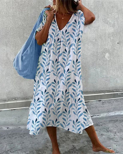 Modefest- Kleid mit V-Ausschnitt und Blattdruck Blau