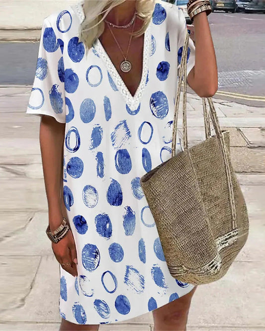 Modefest- Kleid mit Tupfenmuster und V-Ausschnitt Blau