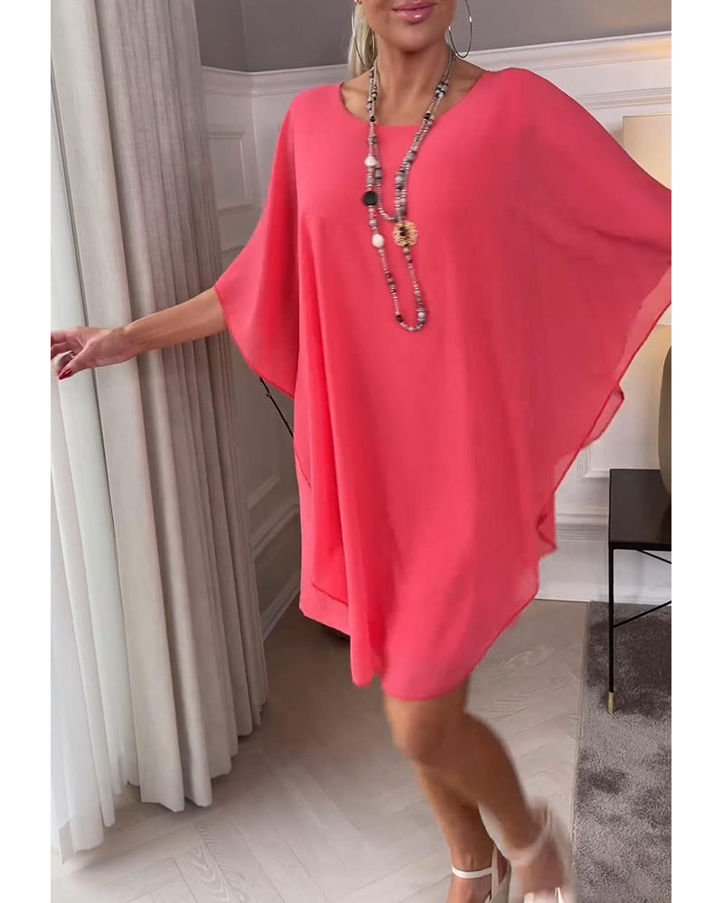 Fashionable, plain dress with batwing sleeves and round neckline