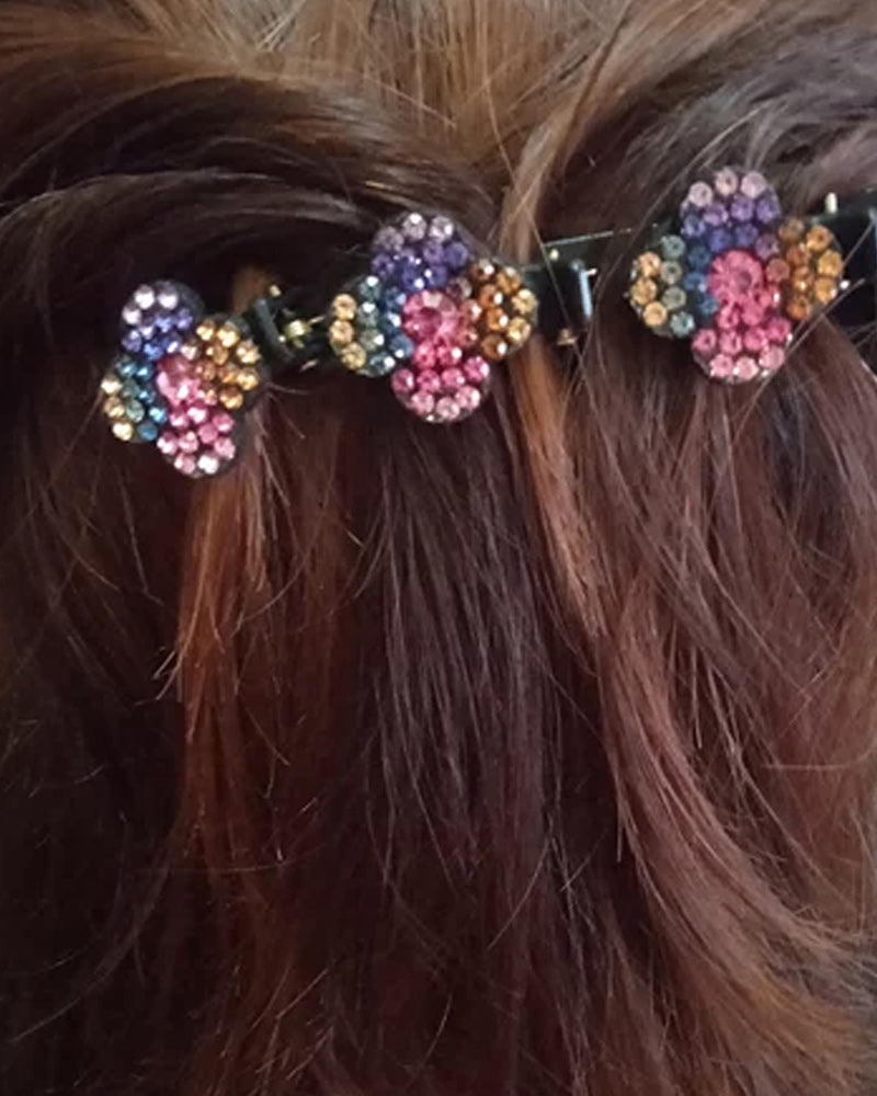 Modefest- Eine Haarspange mit drei Blumen