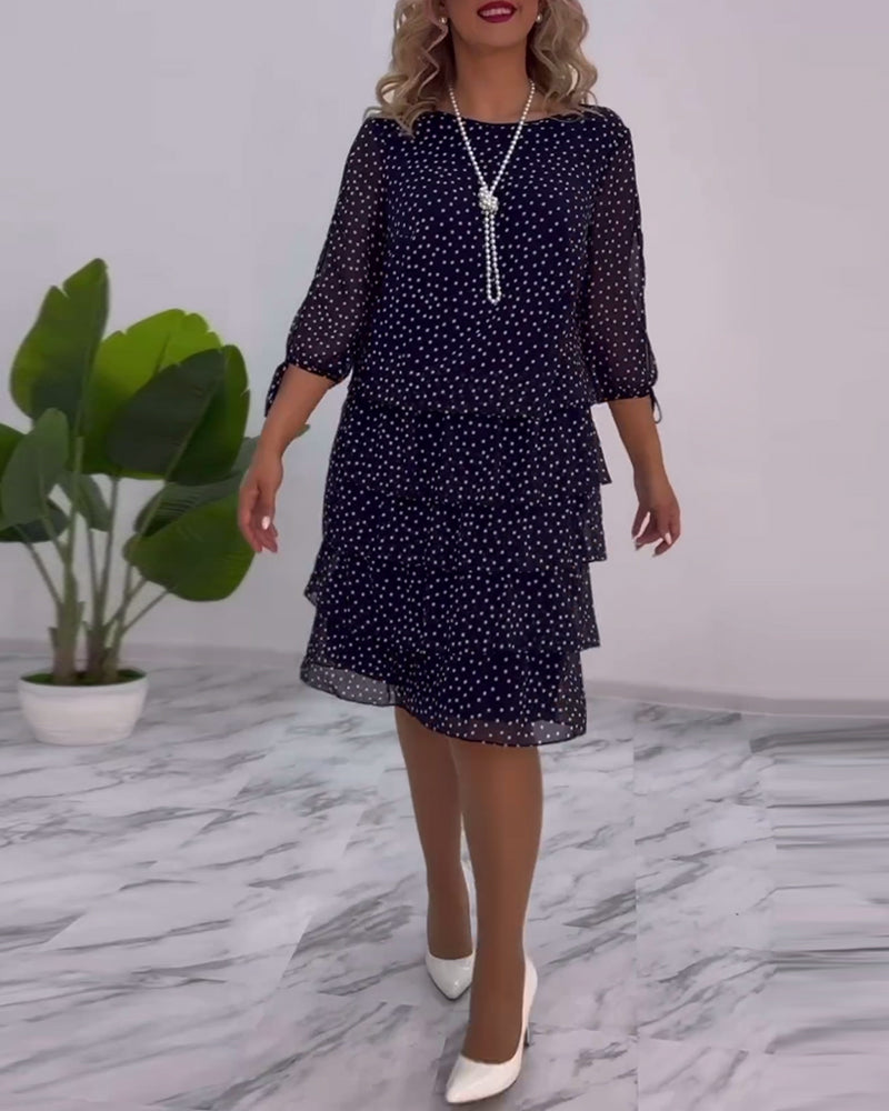 Elegant layered dress with polka dot print