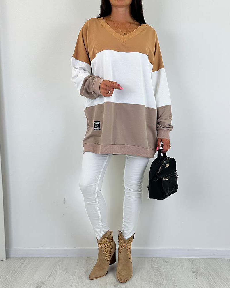 Casual, loose sweatshirt with color block print and V-neck