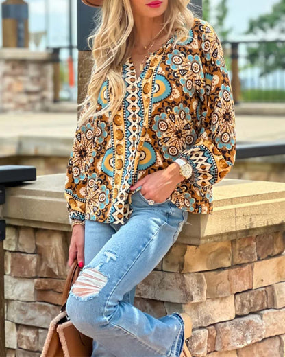 Blouse with lantern sleeves and retro print