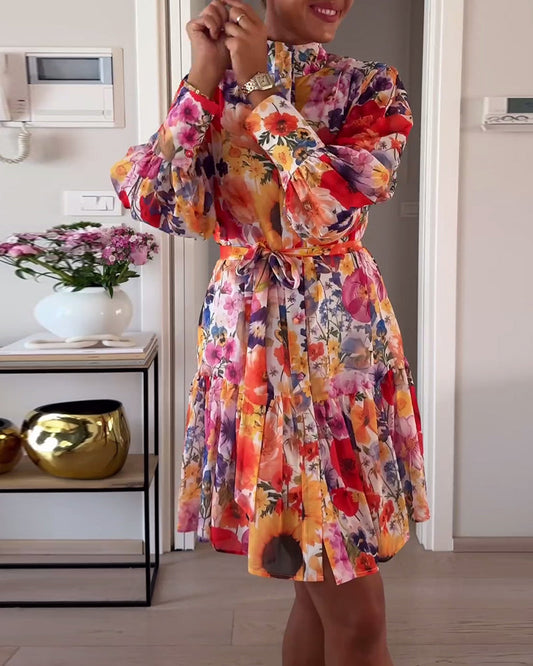 Fashionable, colorful dress with floral pattern and long sleeves