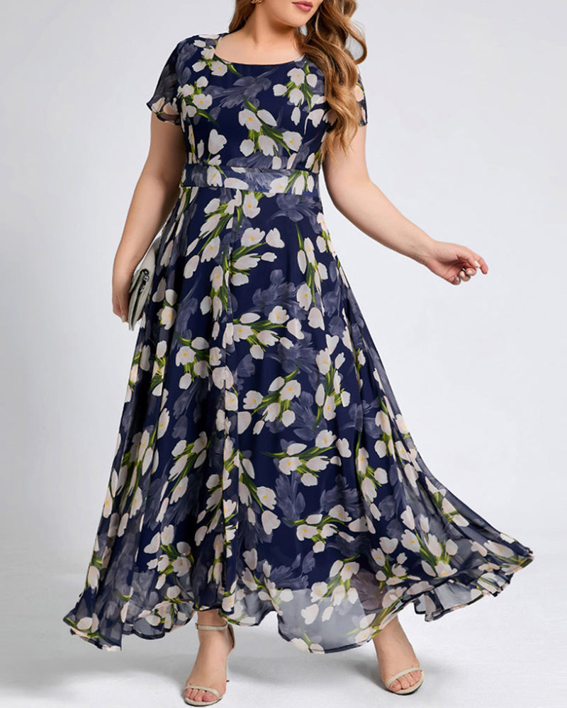 Modefest- Ein Linienkleid mit Blumendruck und kurzen Ärmeln