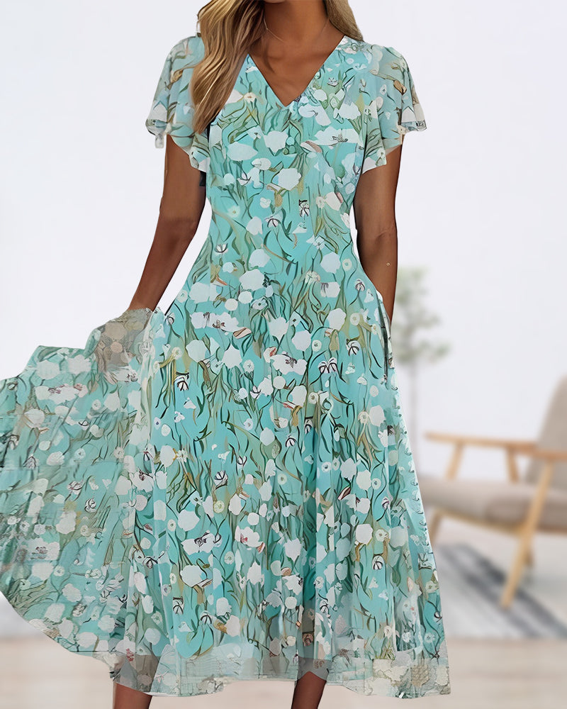 Modefest- Tailliertes Kleid mit Blumendruck und kurzen Ärmeln