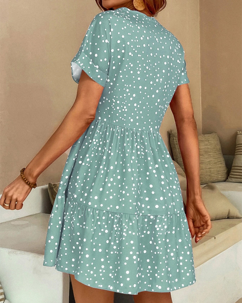 Modefest- Kleid mit V-Ausschnitt und Tupfenmuster