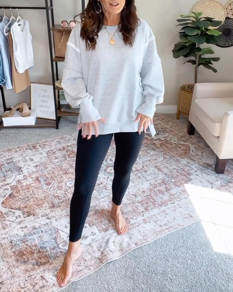 Sweatshirt with round neck, long sleeves and slit seams