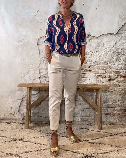 Blouse vintage avec col en V et patte de boutonnage