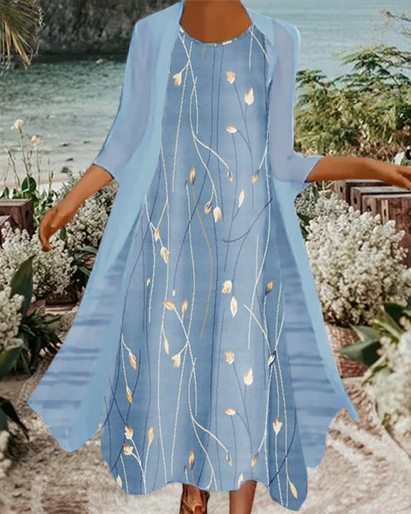Modefest- Kleid mit Blumenmuster und 3/4-Ärmeln