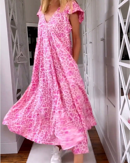 Modefest- Langes, bedrucktes Kleid mit V-Ausschnitt und kurzen Ärmeln