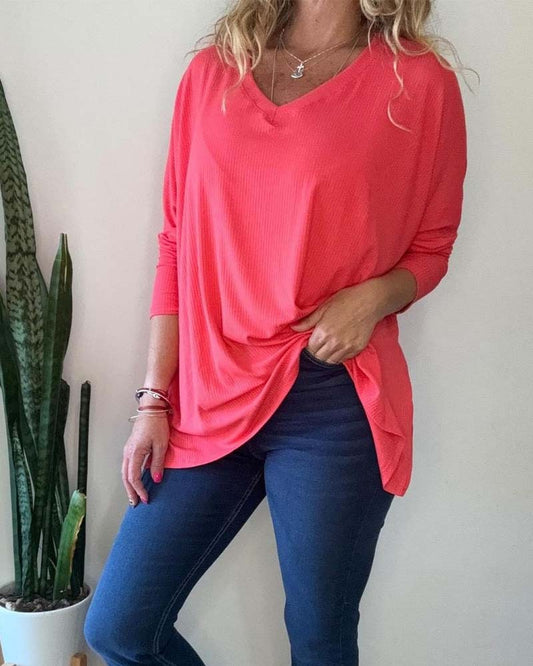 Solid color casual top with V-neck