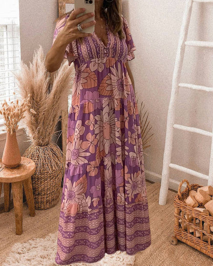 Modefest- Kleid mit Blumendruck und Rüschenärmeln