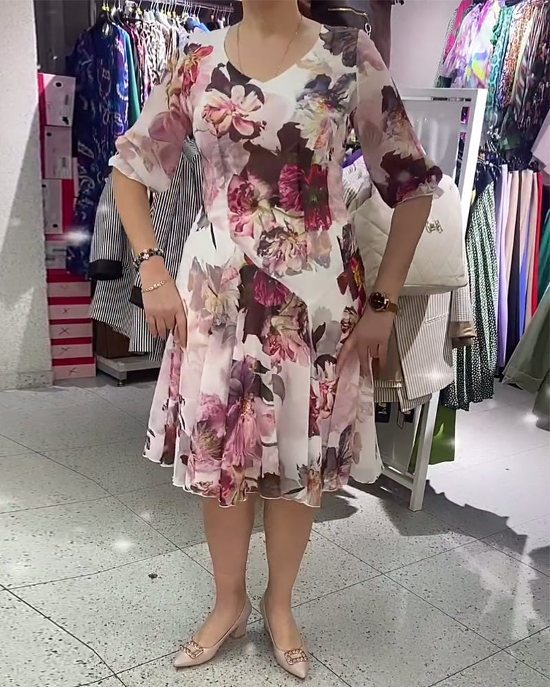 Modefest- Elegantes Kleid mit halblangen Ärmeln und Blumendruck