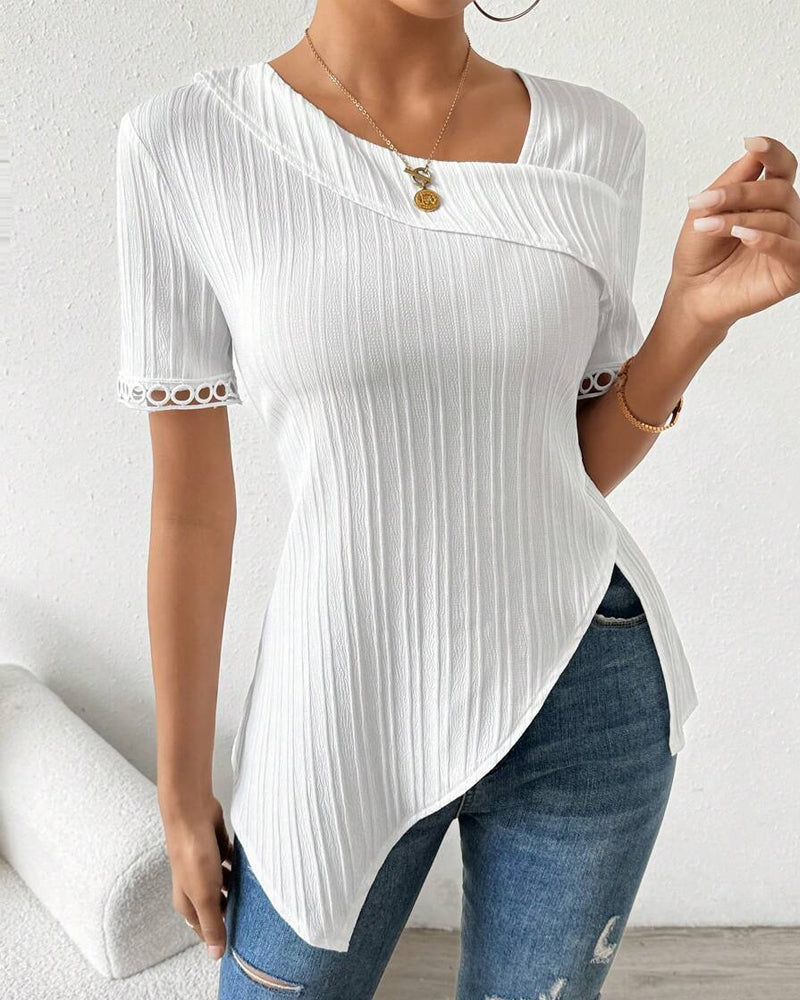 Blouse unie avec dentelle irrégulière