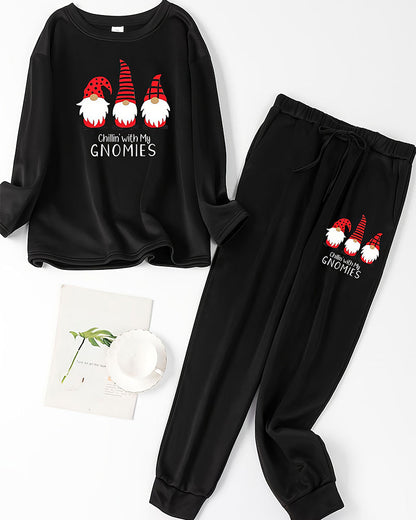 Zweiteiliges set – pullover, sweatshirt und hose mit weihnachtsmann-aufdruck