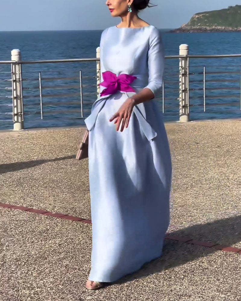 Elegant, plain dress with three-quarter sleeves and bow