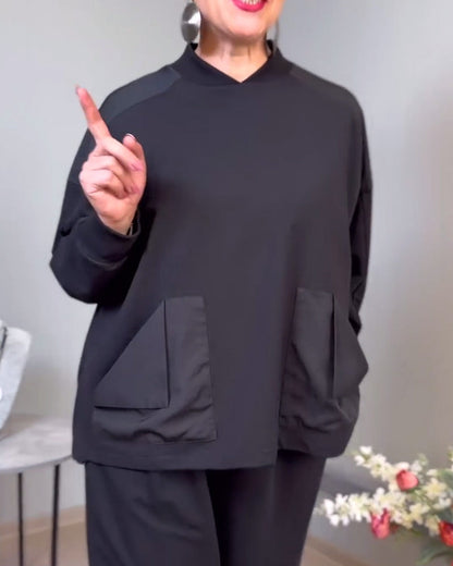 Einfarbiges pullover-sweatshirt mit großen taschen