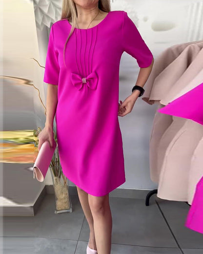 Fashionable dress with plain bow and round neckline