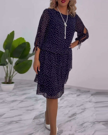 Elegant layered dress with polka dot print