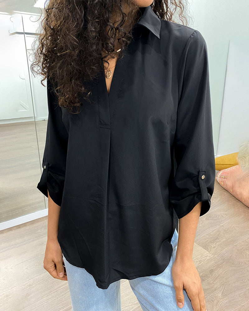 Blouse professionnelle de couleur unie avec revers