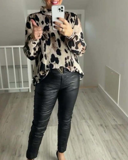 Casual printed blouse with stand collar and long sleeves and folds