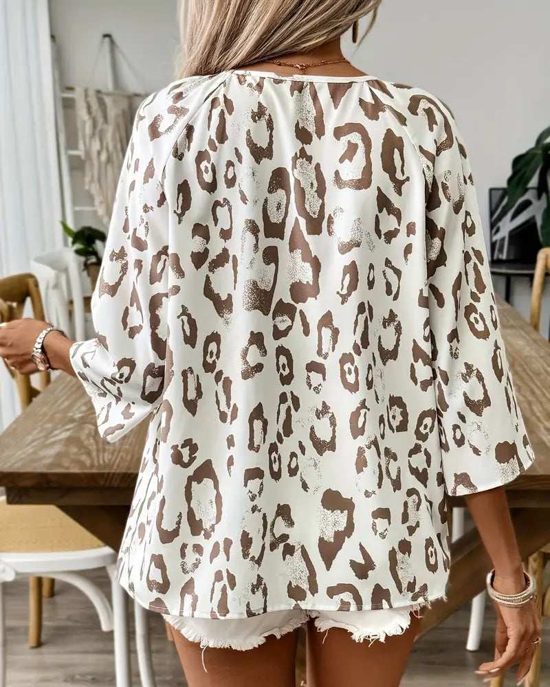 Elegant printed blouse with v-neck