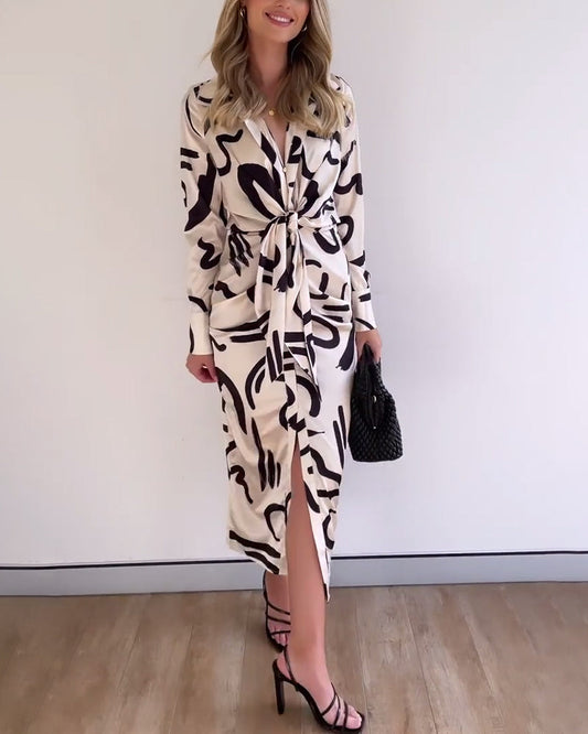 Fashionable printed dress with long sleeves and slit