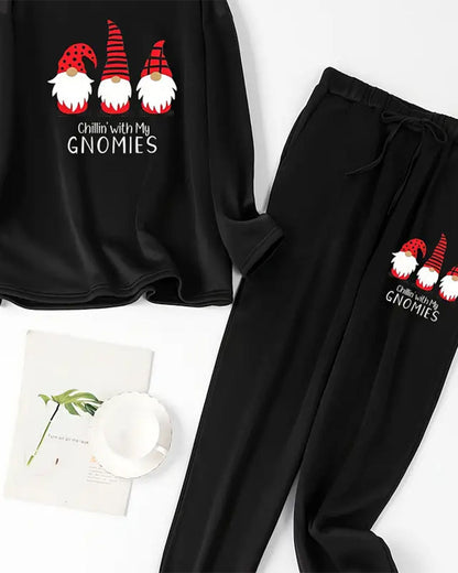 Zweiteiliges set – pullover, sweatshirt und hose mit weihnachtsmann-aufdruck