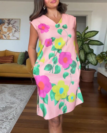 Vestido moderno sin mangas con estampado floral y bolsillo.