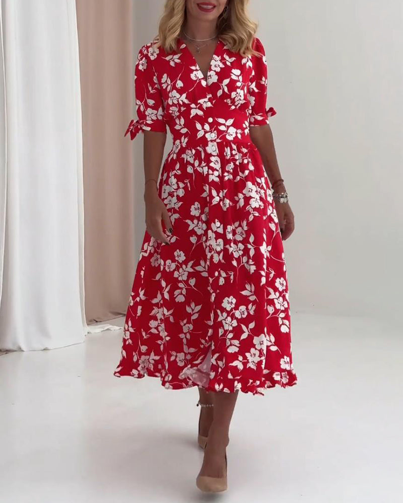 Robe tendance avec motif floral et nœud aux poignets