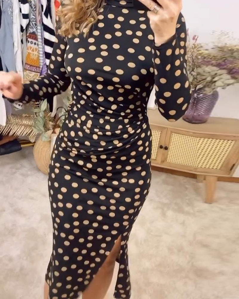 Fashionable dress with dotted pattern, stand-up collar and slit