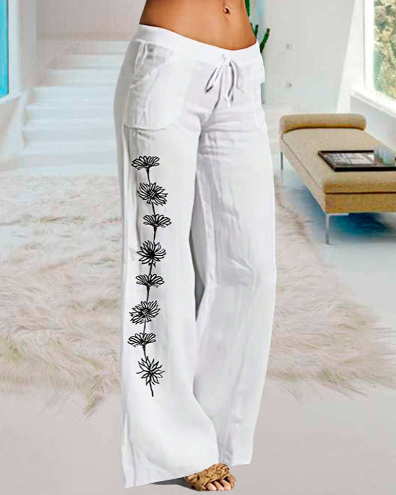 Calça casual de perna larga com padrão floral, amarração e bolso