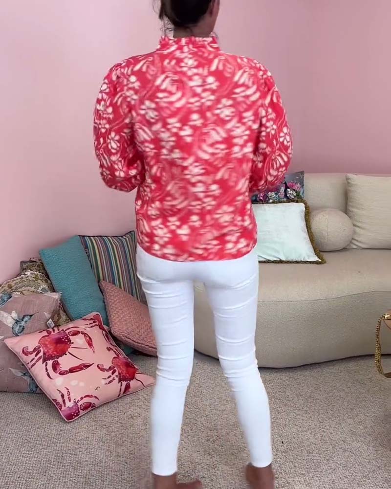 Modefest- Bluse mit blumendruck und laternenärmeln und v-ausschnitt