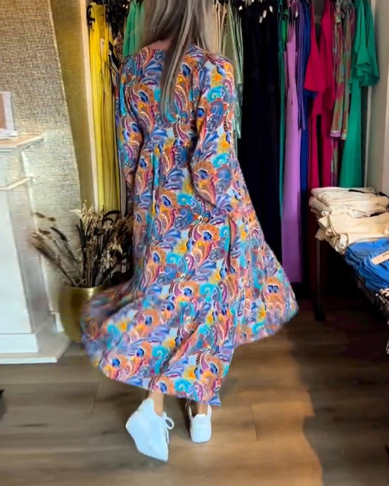 Modefest- Elegantes Kleid mit farbenfrohem Paisley-Print und V-Ausschnitt