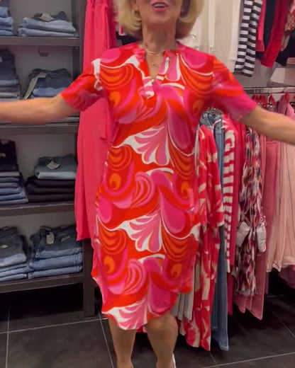 Vestido estampado de moda con cuello en V y manga corta.