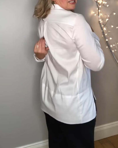 Casual, plain blouse with lapel slit and long sleeves