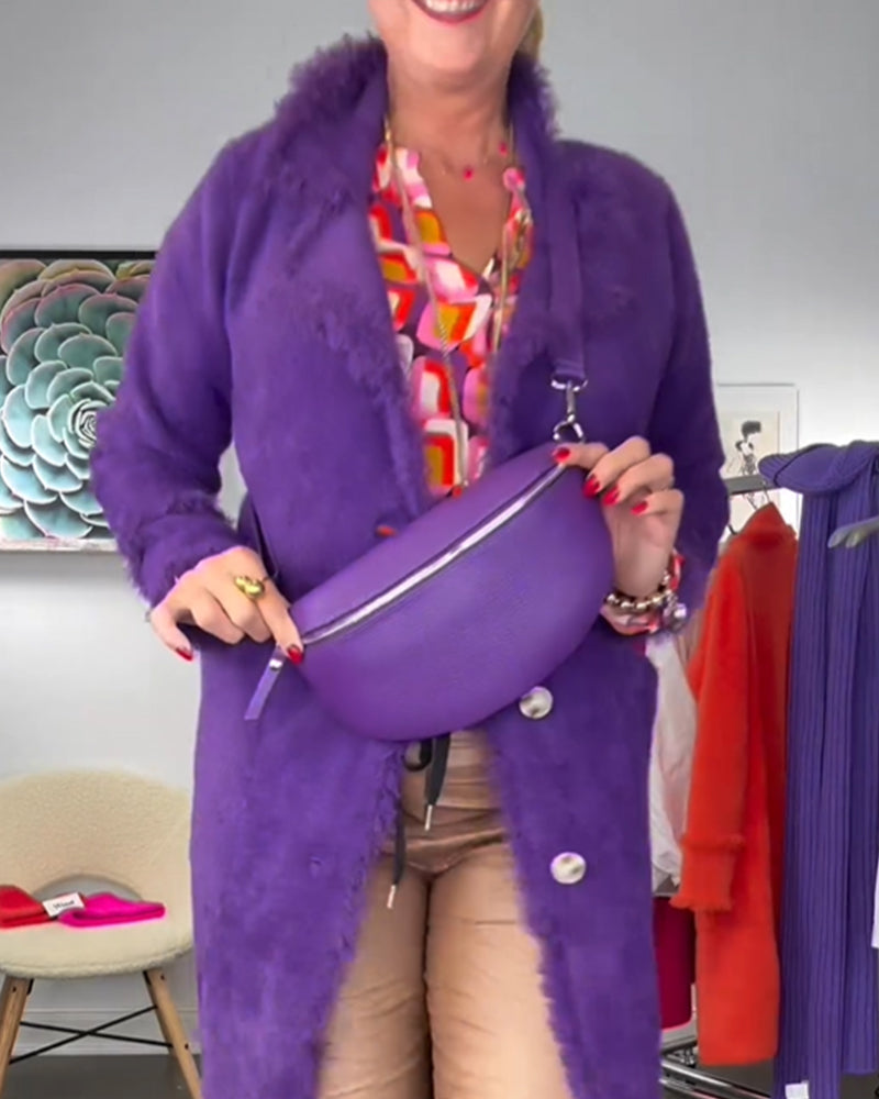 Modefest- Bluse mit kontrastierenden Farben und geometrischen Mustern